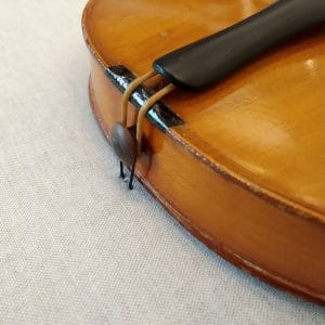 Fijación inferior del violín - Esteve Enmarcadores
